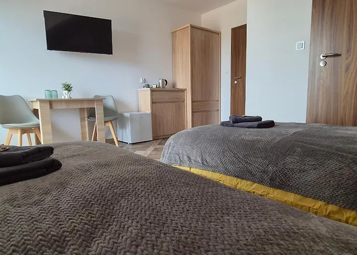 ゲストハウス Karmelowy Zakatek 3*