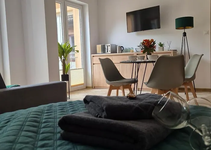 ゲストハウス Karmelowy Zakatek 3*