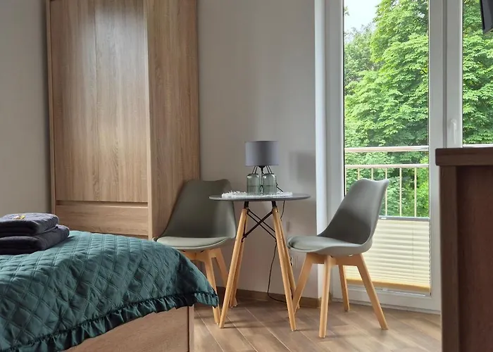 ゲストハウス Karmelowy Zakatek