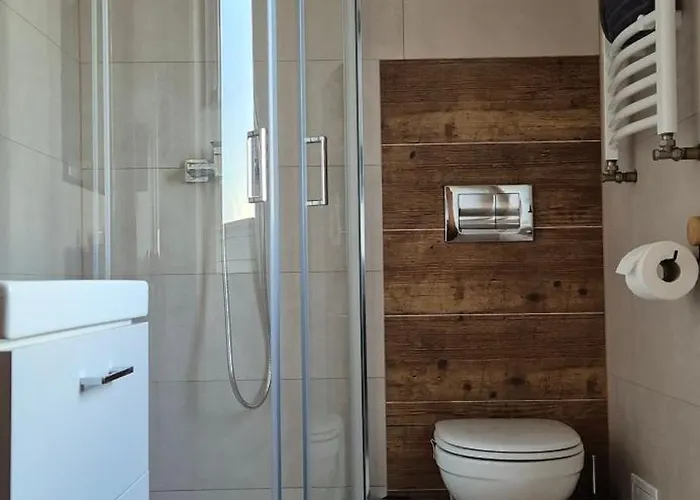 ゲストハウス Karmelowy Zakatek 3*