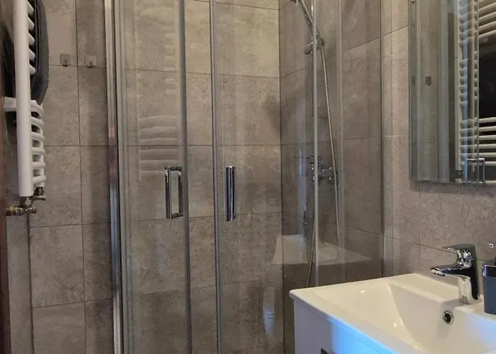 ゲストハウス Karmelowy Zakatek